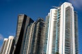 Modern highrise luxury condos in Sunny Isles Beach FL on blue sky Royalty Free Stock Photo