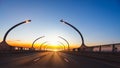 Modern highway toll road at sunset Royalty Free Stock Photo