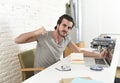 Modern hipster style student or businessman working in stress with laptop at home office angry upset Royalty Free Stock Photo