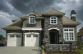 Large Designer Home Exterior Canada House Roofing Front Stonework Double Garage Royalty Free Stock Photo