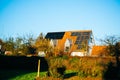 Modern home with installed solar panels. Sun energy source to produce electricity for own needs Royalty Free Stock Photo