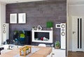 Modern home living room area with television and loudspeakers Royalty Free Stock Photo