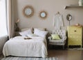 Modern home interior design. Bed with and pillows, blanket. girl`s bedroom interior, scandinavian style