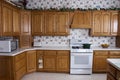 Modern Home Kitchen, Stove, Oak Cabinets Interior Royalty Free Stock Photo