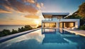 Modern home with large windows overlooks a serene pool at sunset, showcasing architectural beauty and natural elegance