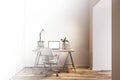 A modern home office setup with a laptop on a desk, a chair, lamp, and books, depicted in a minimalist interior design on a plain Royalty Free Stock Photo