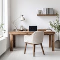 Modern home office with wooden desk and office chair against of white wall. Scandinavian interior design Royalty Free Stock Photo