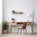 Modern home office with wooden desk and office chair against of white wall. Scandinavian interior design of modern living room Royalty Free Stock Photo