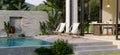 Modern home with swimming pool or Luxury private pool villa outdoor design with beach chairs Royalty Free Stock Photo