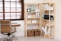 Modern home workplace with wooden storage