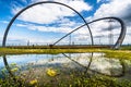 Modern horizon observatory on Halde Hoheward in Herten, Germany, with beautiful reflection after summer rain