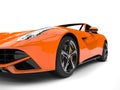 Modern hot orange fast concept car - front wheel closeup shot Royalty Free Stock Photo