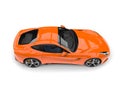 Modern hot orange fast concept car - top down view