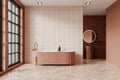 Modern hotel bathroom interior with bathtub and sink, panoramic window Royalty Free Stock Photo