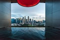 Modern Hotel with Blue Sky in Sunset Blue Hour against modern metropolis city