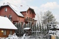 Modern hotel covered with snow in winter morning