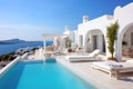 Modern hotel with pool and view of Mediterranean Sea in Greek style Royalty Free Stock Photo