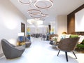 A modern hotel with a reception area and lounge with large upholstered designer chairs and a large chandelier of golden rings