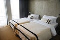 Modern hotel room with twin beds interior Royalty Free Stock Photo