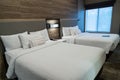 Modern hotel room with two queen beds, with contemporary design Royalty Free Stock Photo
