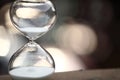 Modern Hourglass on bokeh background