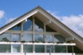 Modern house with balcony, blue sky