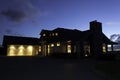 Modern house exterior with lighting at night