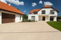 Modern house and outbuilding with garage