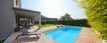 Modern house with pool Royalty Free Stock Photo