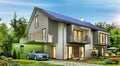 Modern house with solar panels on the roof and electric car Royalty Free Stock Photo