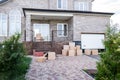 modern house with stacks of cardboard boxes