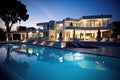 Modern house with swimming pool at night. Luxury house exterior, Inviting Retreat, Contemporary Residence luxury villa with large Royalty Free Stock Photo