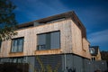 Modern house, with wooden cladding - wooden facade, Royalty Free Stock Photo