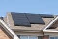 modern houses with solar panels on the roof for alternative energy Royalty Free Stock Photo