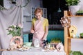 Modern housewife cooks in the kitchen. portrait of a woman cook with mixer. Preparing for Easter Royalty Free Stock Photo