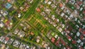 Modern housing development in crowded suburban community, high up above generated by AI Royalty Free Stock Photo