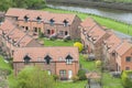 Modern housing development by river Royalty Free Stock Photo