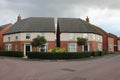 Modern housing estate showing two detached houses UK Royalty Free Stock Photo