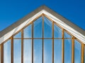 Modern, huge triangle, glass roof under the blue sky