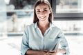 Joyful happy woman holding her smartphone Royalty Free Stock Photo