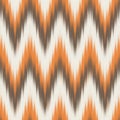 Modern Ikat Autumn Ember: Chevron Zigzag Pattern in Brown, Orange, and White with Optical Flow Royalty Free Stock Photo