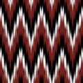 Modern Ikat Autumn Ember: Chevron Zigzag Pattern in Red, Black, and White with Tribal Rhythm Royalty Free Stock Photo