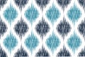 Modern Ikat geometric folklore ornament with diamonds. Tribal ethnic vector texture. seamless striped pattern in Aztec style.