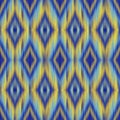 Modern Ikat Skyflare: Diamond Gradient Pattern in Blue, Yellow, and White with Woven Symmetry Royalty Free Stock Photo