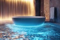 Modern illuminated bathtub in a luxurious spa setting with water features at night Royalty Free Stock Photo