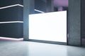 Modern illuminated concrete gallery interior with empty white mock up banner. Royalty Free Stock Photo