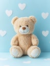 A modern image depicts a light brown teddy bear sitting against a blue backdrop that includes pastel hearts Royalty Free Stock Photo