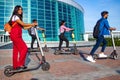 Modern indian friends ride on segway in park in India