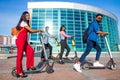 modern indian friends ride on segway in park in India