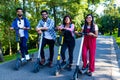 modern indian friends ride on segway in park in India